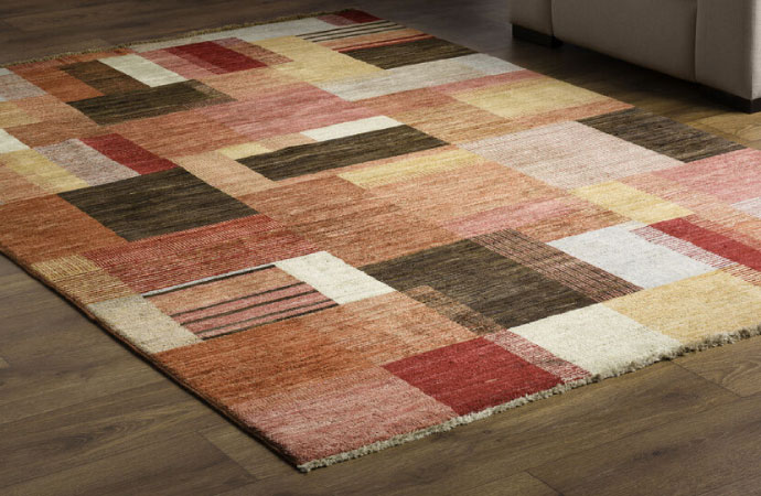 Patterned tufted rug on the floor