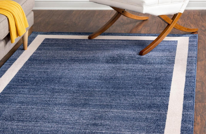 blue tufted rug on the floor